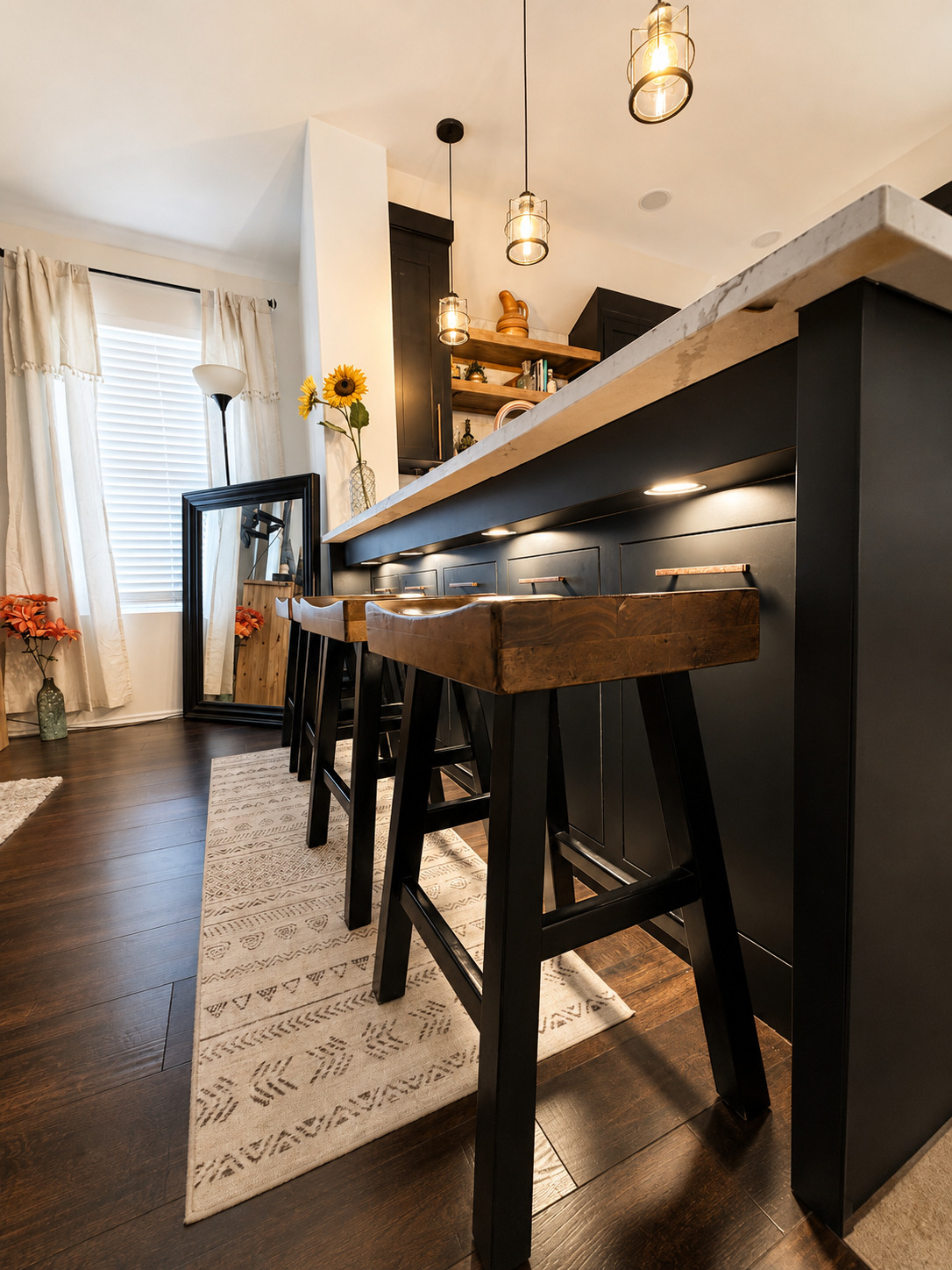 Interior cabinet lift hardware mounted inside a light wood cabinet with a dark door front.