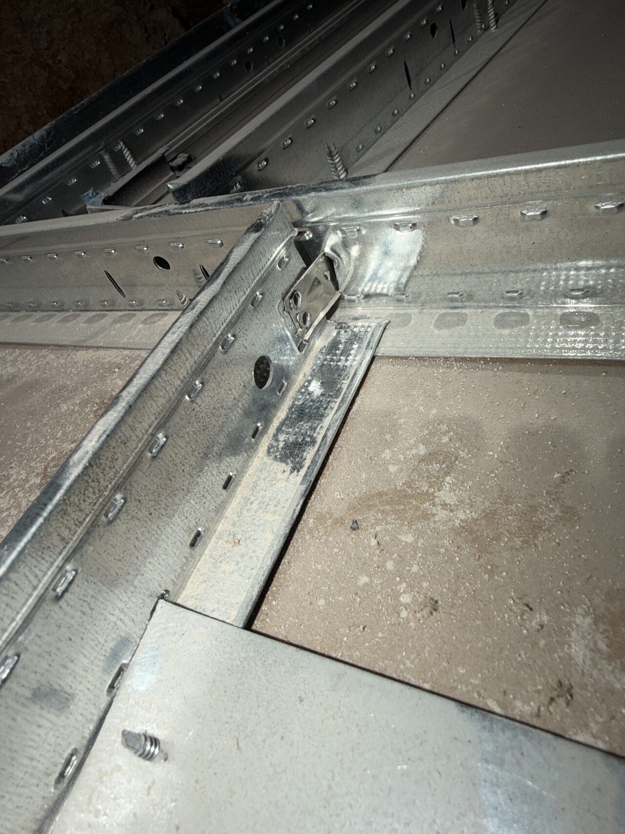 Track or floor hardware detail documented as part of the built-in installation coordination for a Joel Hodge project.