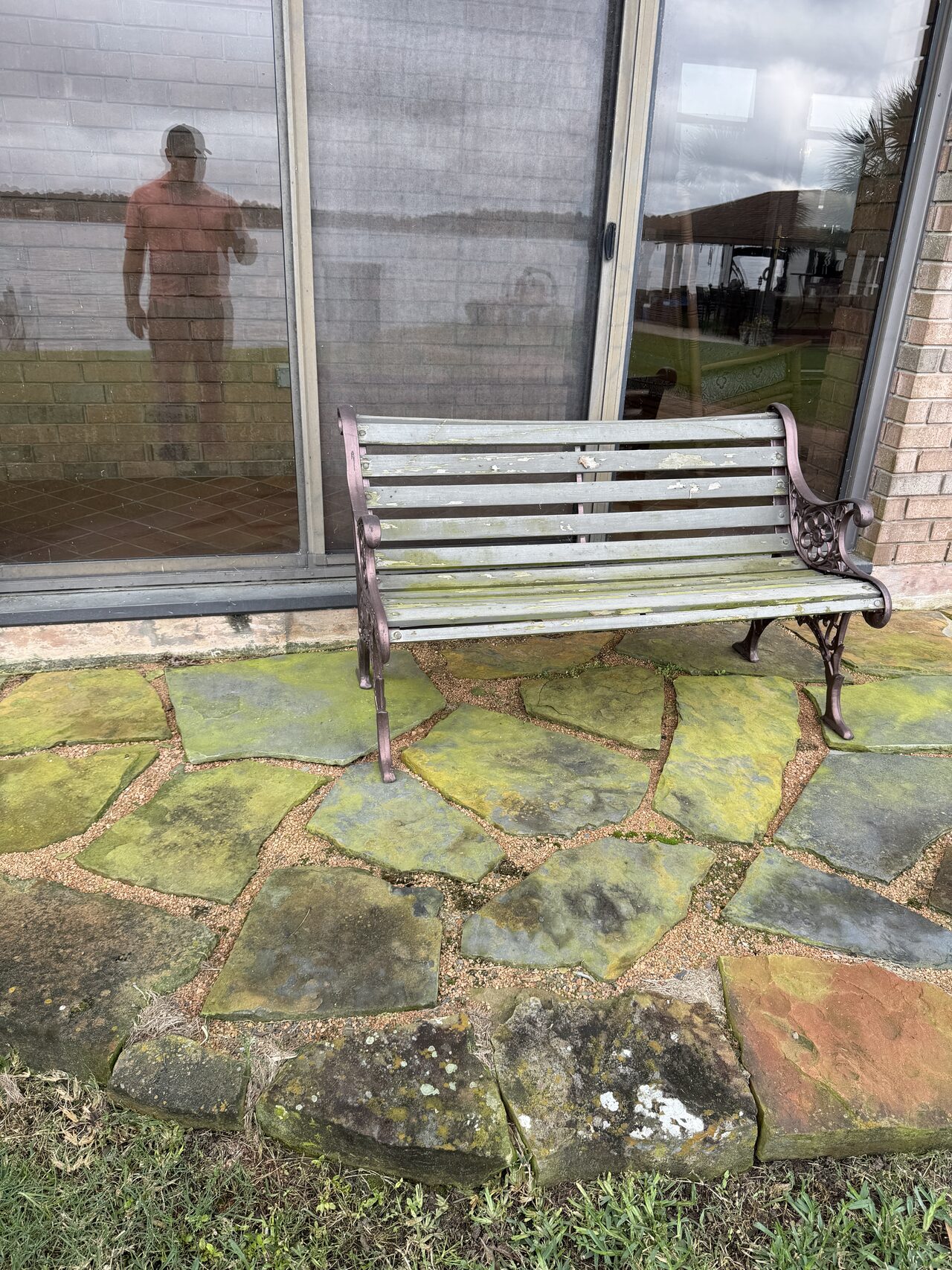 Patio stone surface and lower wall area reviewed around the exterior window and seating zone for a Joel Hodge project.