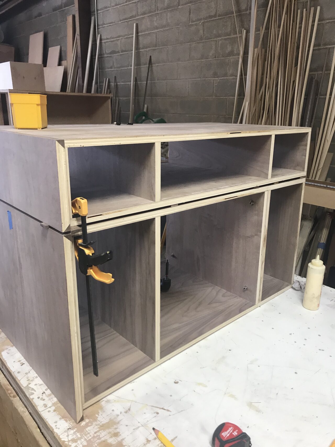 Shop-built vanity cabinet carcass with open bays clamped for square before faces were added for a Joel Hodge project.