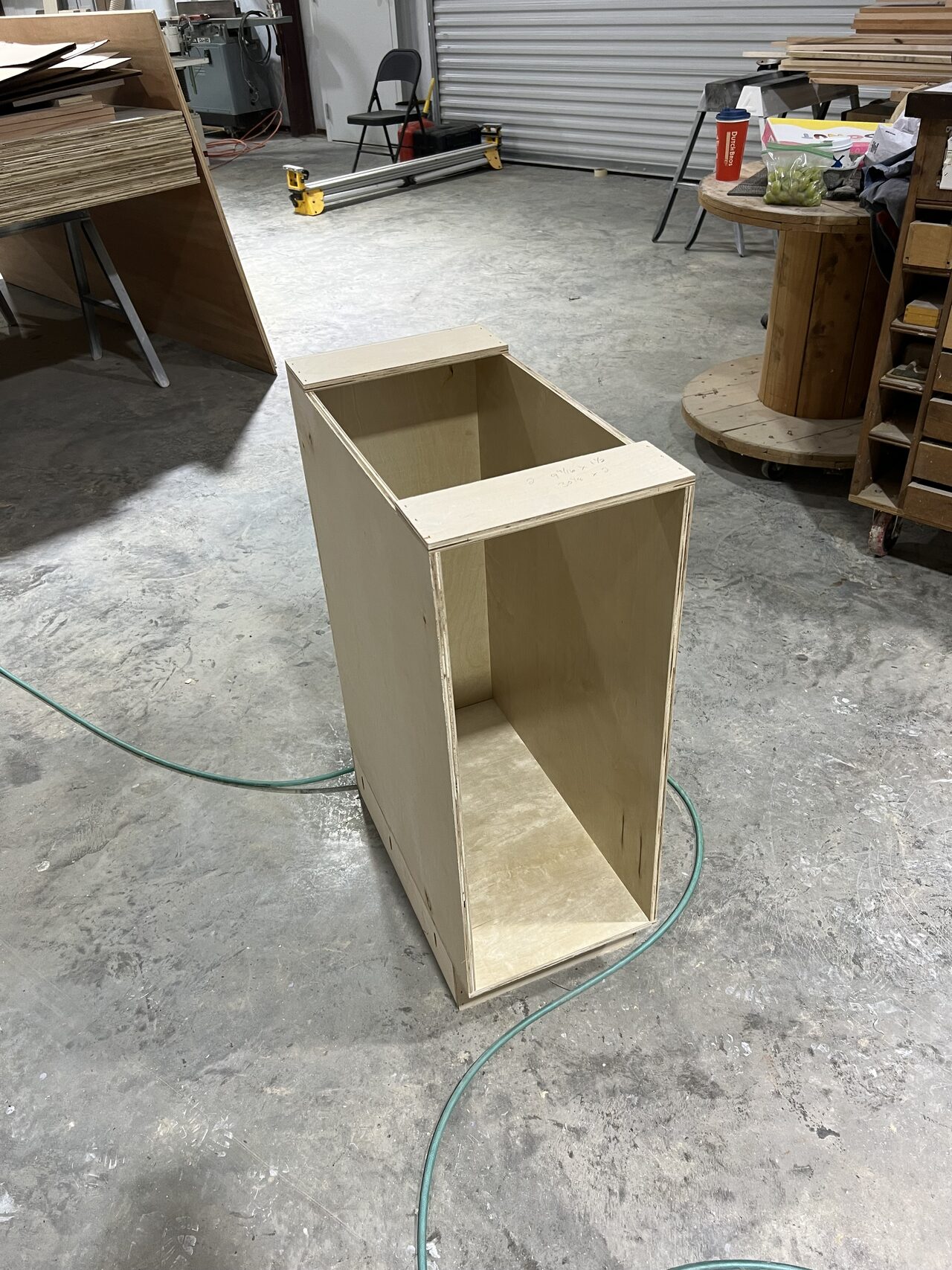 Single base cabinet carcass reviewed for square, depth, and shelf opening size for a Joel Hodge project.