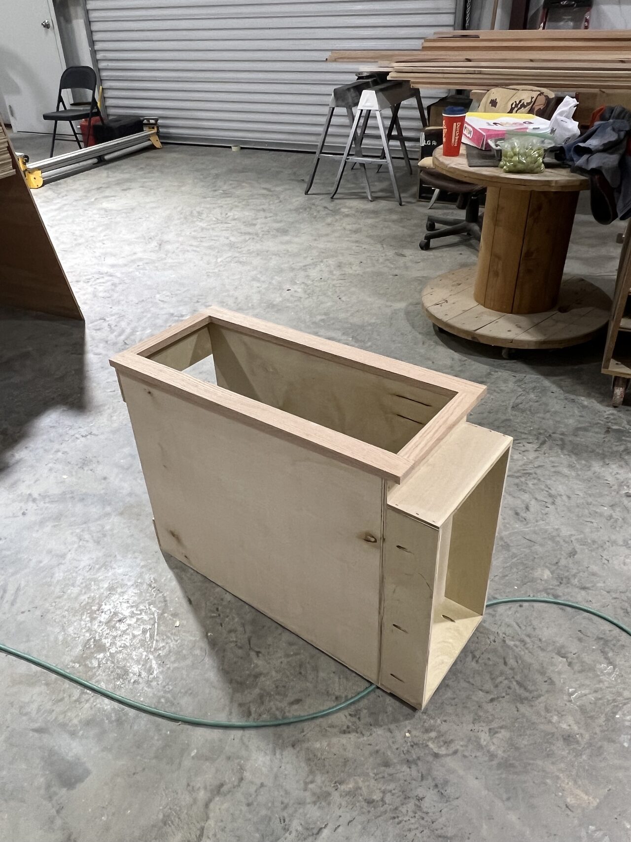 Base cabinet box with side extension checked before final trim and installation for a Joel Hodge project.