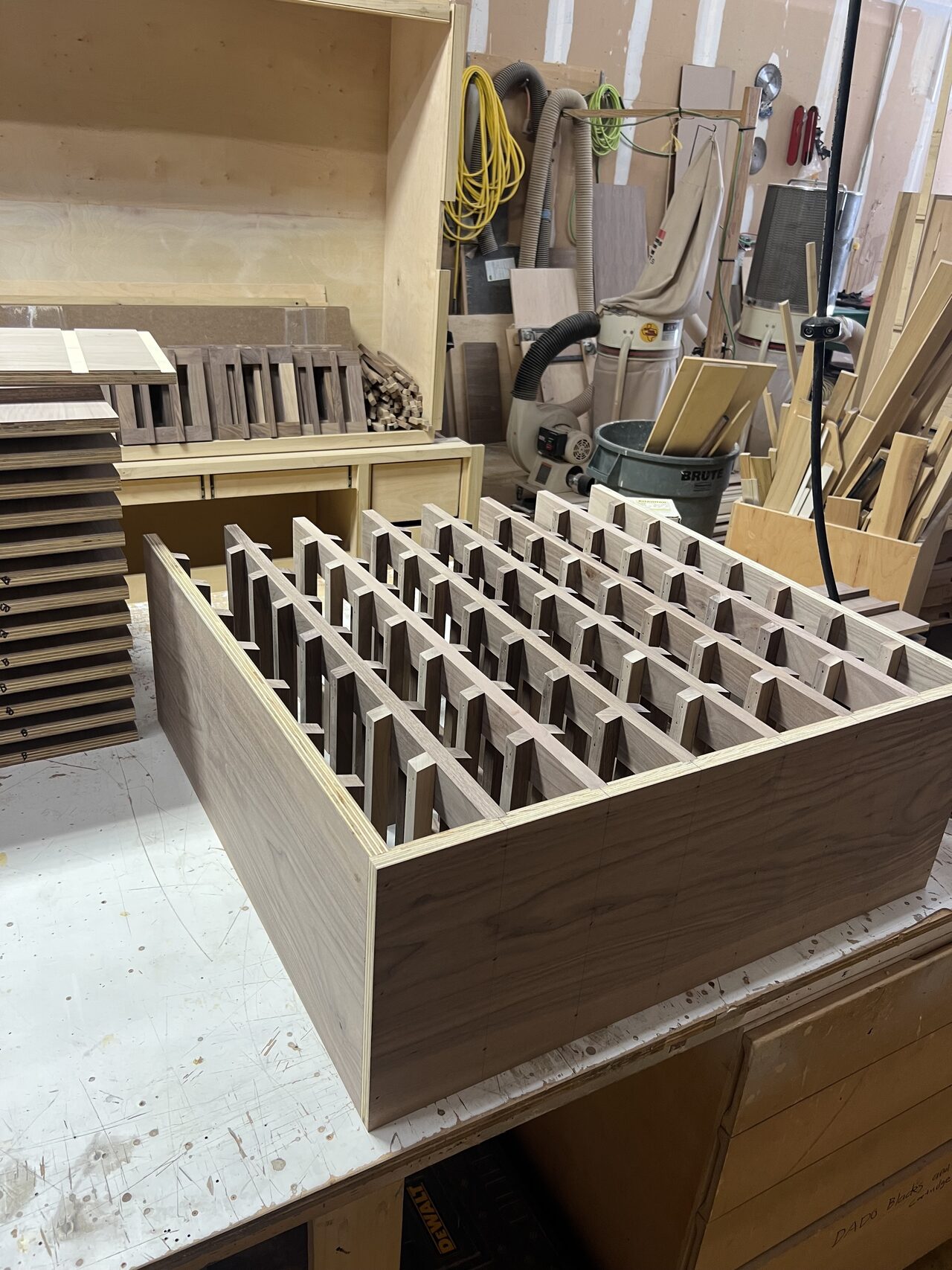 Wine bottle grid insert assembled on the bench with repeated openings checked for consistency for a Joel Hodge project.