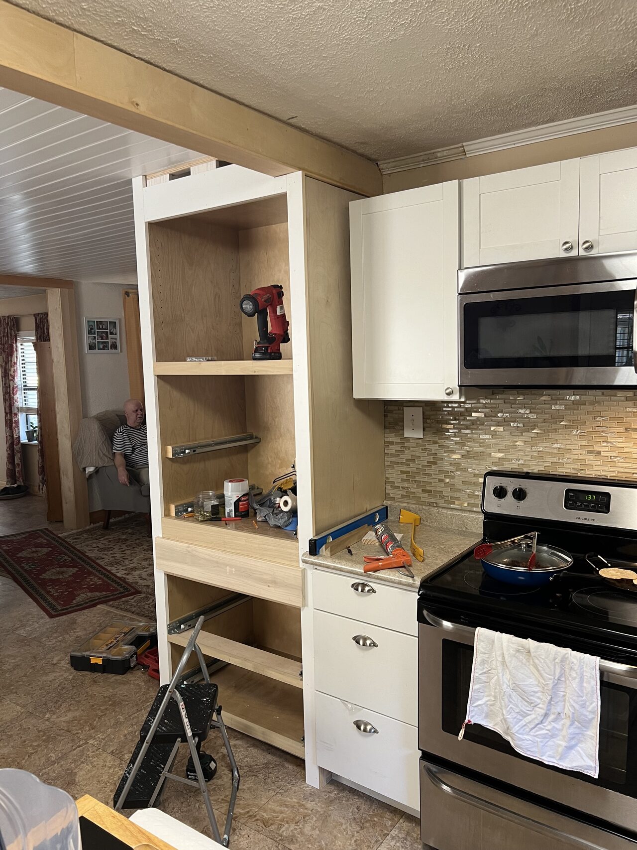 Small kitchen cabinet area reviewed around the range and wall cabinets for alignment and clearance for a Joel Hodge project.
