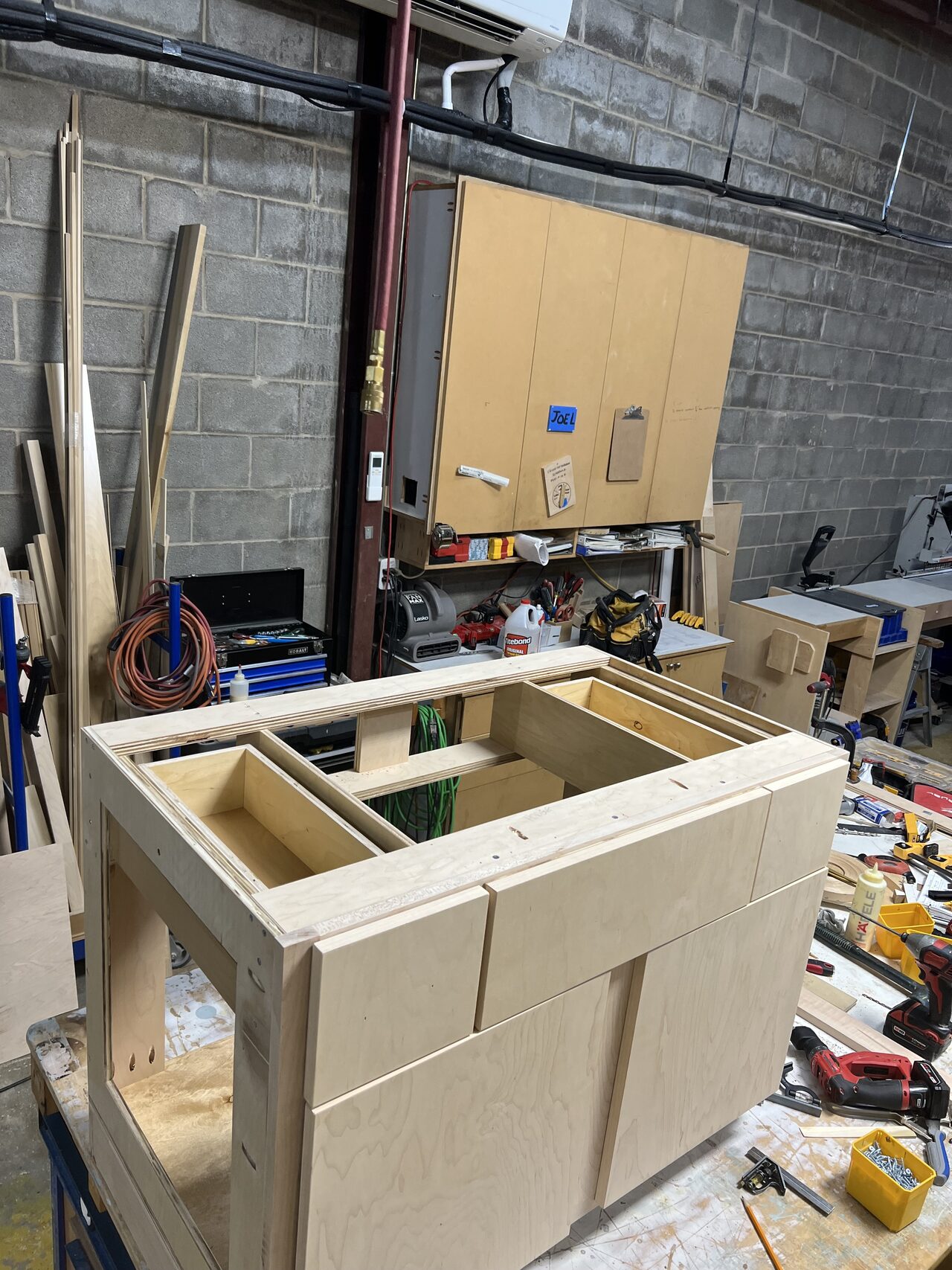 Partially assembled vanity base checked in the shop before transport to the site for a Joel Hodge project.