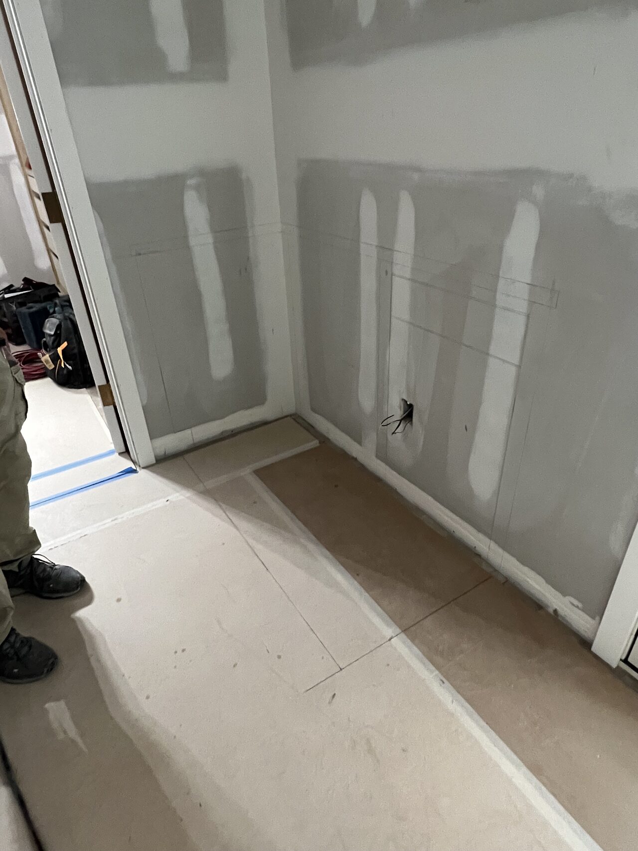 Drywall and niche wall area reviewed before built-in panels and trim were completed for a Joel Hodge project.
